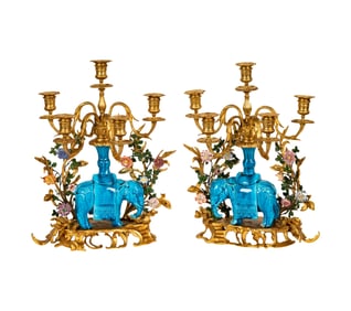 A Pair of Gilt Metal and Porcelain Five-Light Candelabra