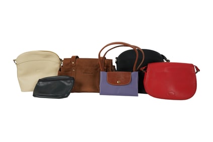 A Group of Longchamp Handbags