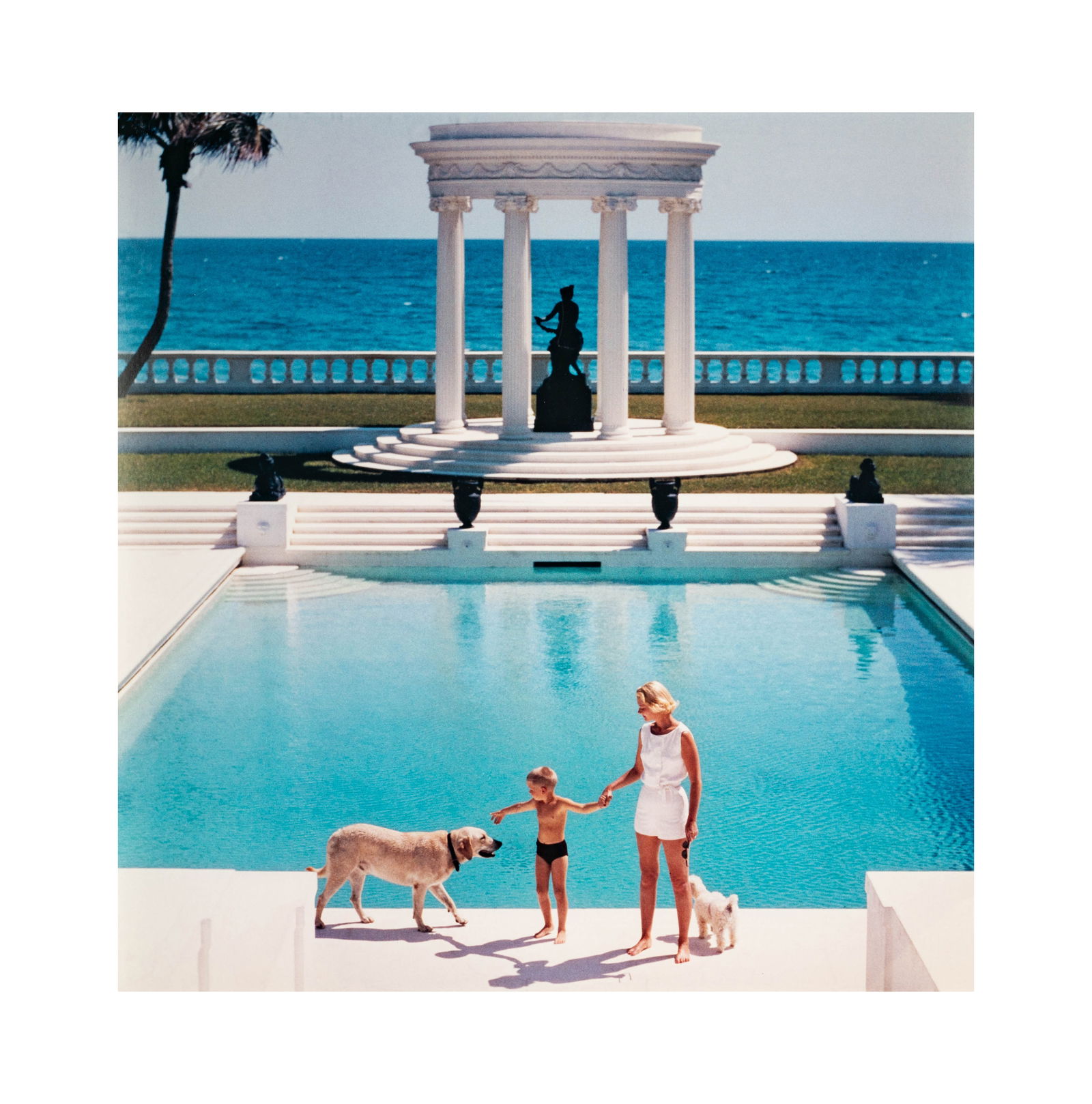 After Slim Aarons (1916-2006): Nice Pool (CZ Guest and son in Palm Beach) (1 of 7)
