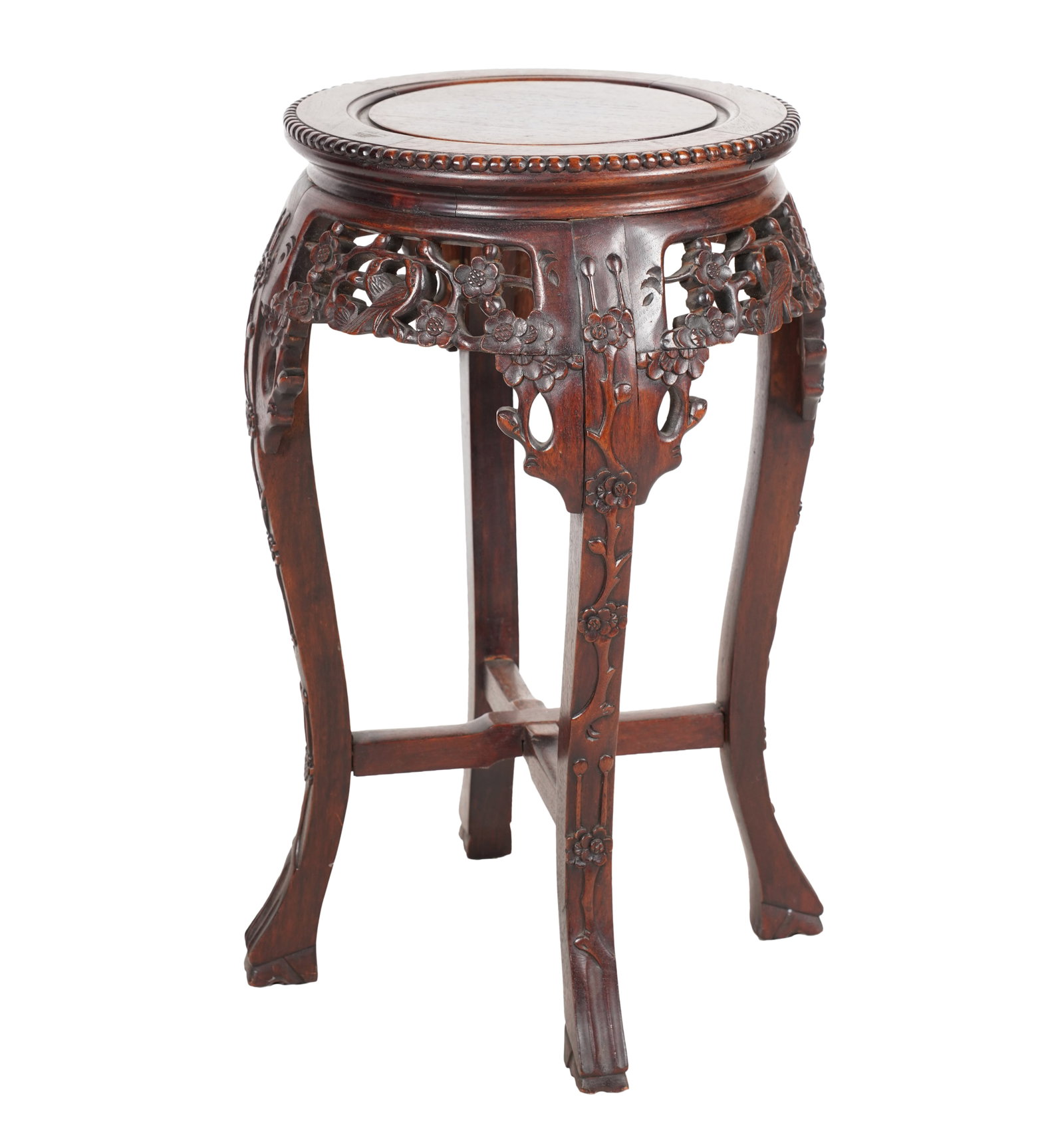 A Chinese Carved Hardwood Stand: with pierced floral apron 25 1/2 x 15 in. (64.8 x 38.1 cm.)