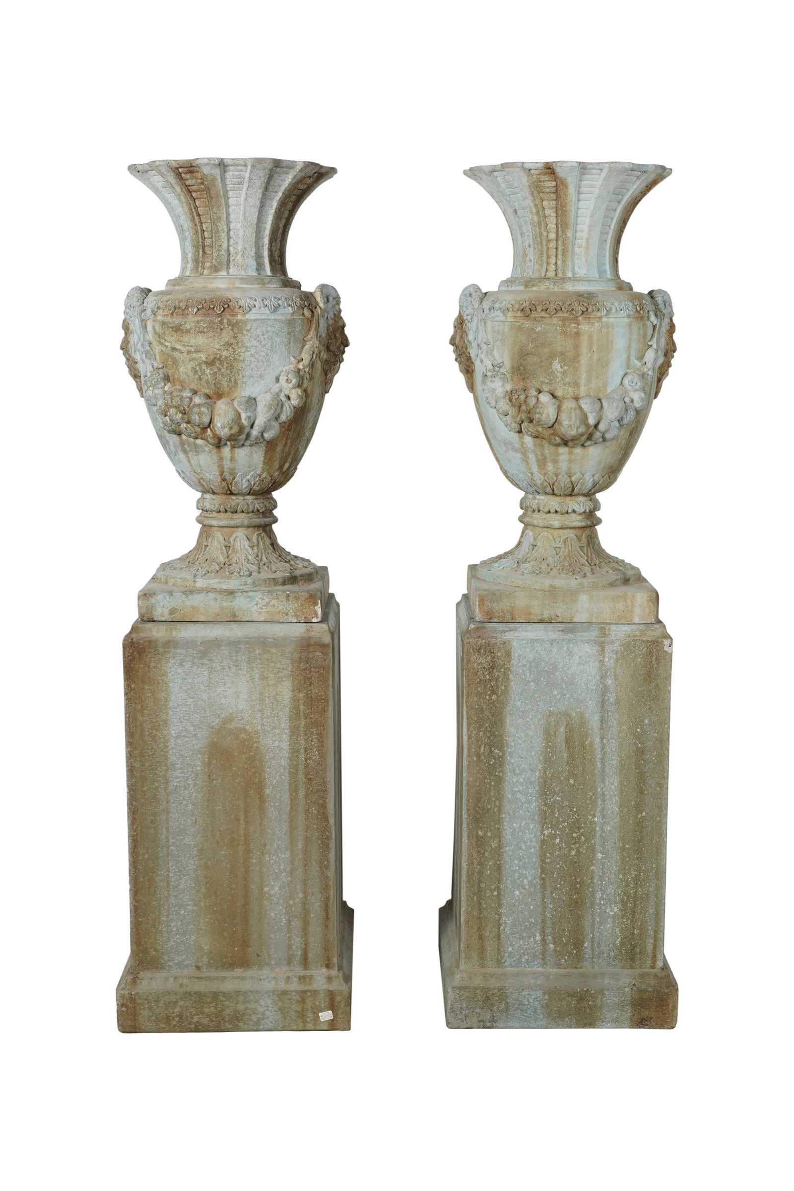 A Pair of Neoclassical-Style Garden Urns on Pedestals: cast cement with faux verdigris finish Pedestals: 32 x 18 x 18 in., Urns: 34 1/2 x 18 in.