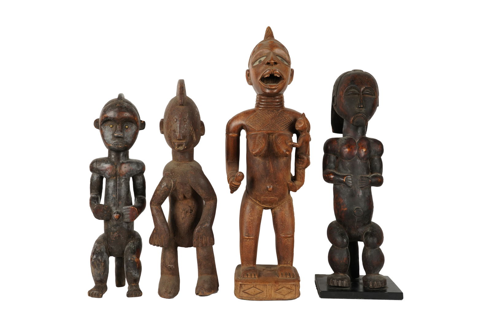 Four Carved African Figures (1 of 9)