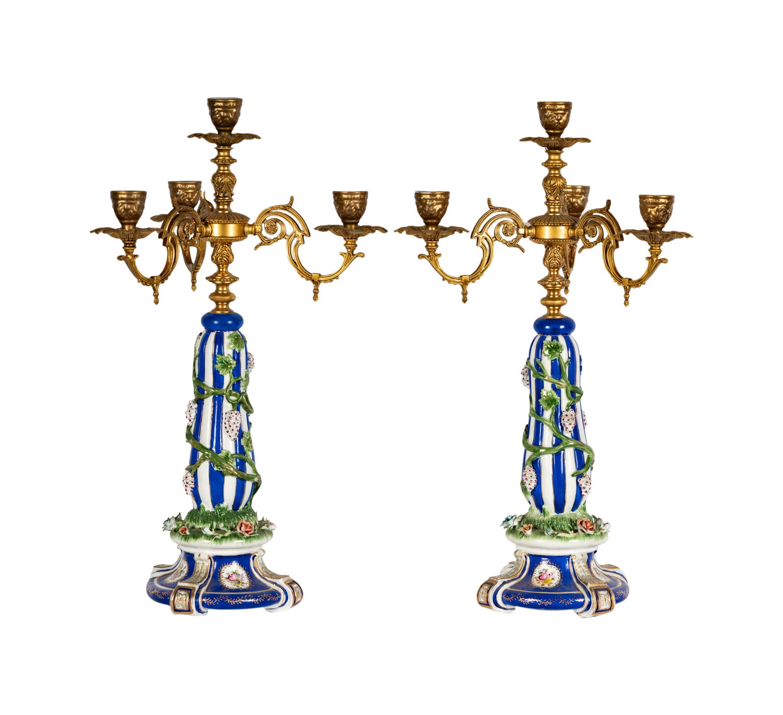 A Pair of Meissen-Style Porcelain Four-Light Candelabra: with gilt metal mounts 24 1/2 x 14 in. (62.2 x 35.6 x 35.6 cm.)
