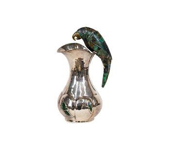 A Los Castillo Silverplate and Stone Parrot Pitcher: marked "TA-01 / Plateado / Hecho en Mexico / Los Castillo / Taxco" 14 x 8 x 6 1/2 in. (35.6 x 20.3 x 16.5 cm.)