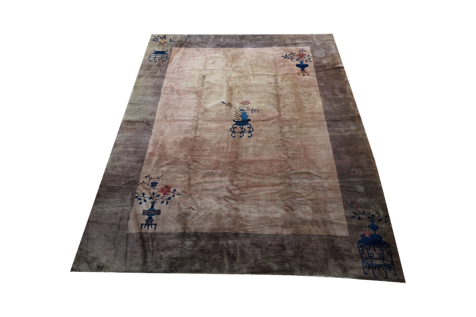 A Chinese Art Deco Rug: wool on cotton 141 1/2 x 102 in. (359.4 x 259.1 cm.)