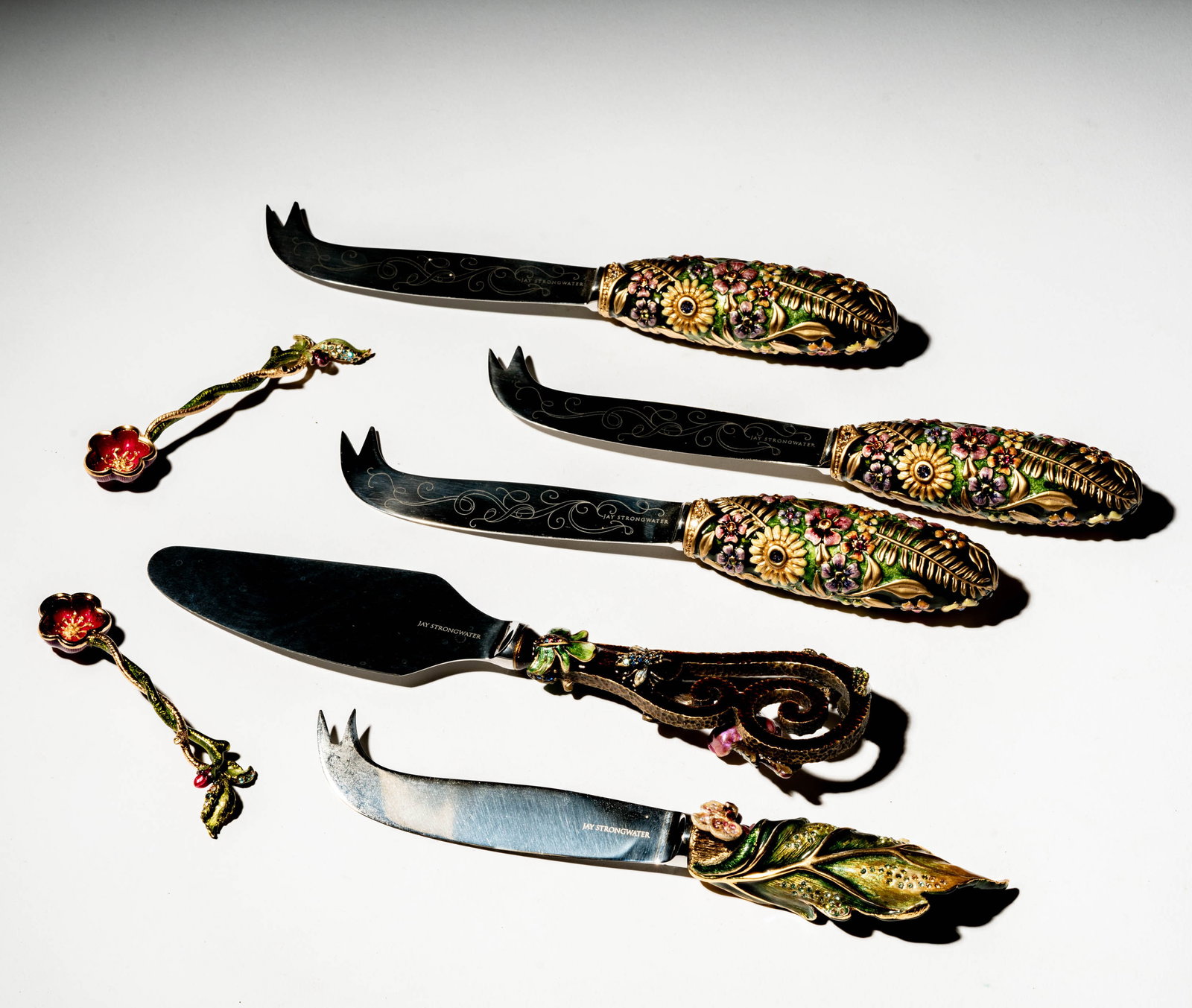 Five Jay Strongwater Cheese Knives: together with two spoons [7 pieces]