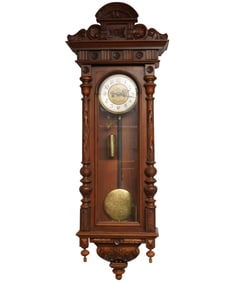 A Continental Carved Wood Wall Clock
