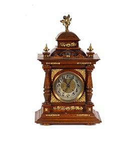 A Lenzkirch German Oak and Brass Mounted Figural Mantle / Shelf Clock