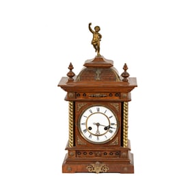 A Lenzkirch Oak and Brass Mounted Figural Mantle