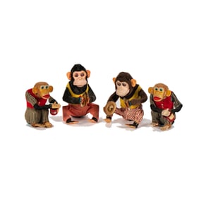 A Group of Vintage Battery Operated Monkey Mechanical Toys