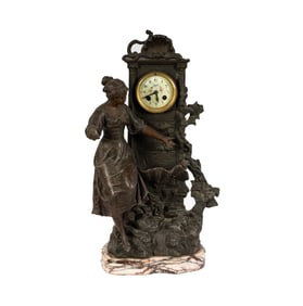 A French Spelter and Marble Figural Clock