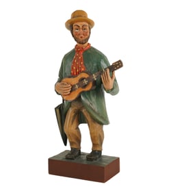 A Wood-Carved Whistling Automaton