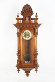 A 19th Century Walnut Carved Wall Clock