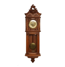 A Gustav Becker Carved Walnut Wall Clock