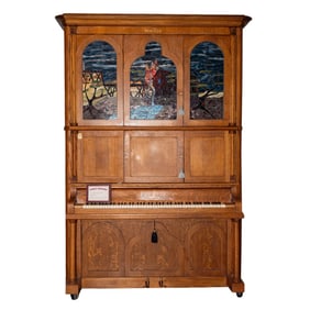 A Wurlitzer Oak and Stained Glass Orchestrion