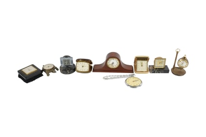 A Collection of Vintage Travel Alarm and Desk Clocks