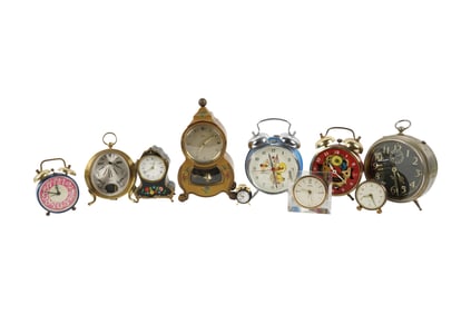 A Collection of Vintage Alarm Clocks and Table Top Clocks