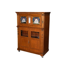 A Western Electric Piano Co. Oak and Stained Glass Nickelodeon