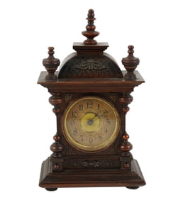 A Junghans Black Forest Miniature Table Top Clock