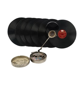 A Mikiphone Pocket Portable Phonograph with Records
