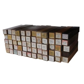 A Collection of 60 Assorted QRS Piano Player Rolls
