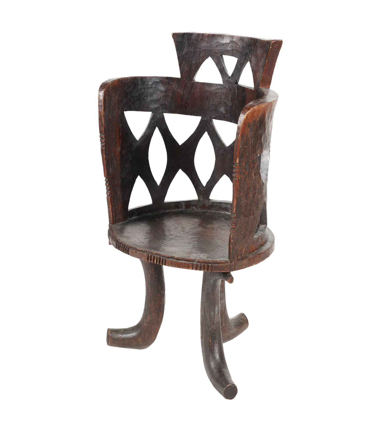 An African Carved Wood Jimma Chair: Ethiopia 42 x 22 x 20 in. (106.7 x 55.9 x 50.8 cm.)