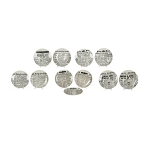 A Set of Eleven Piero Fornasetti Porcelain Plates