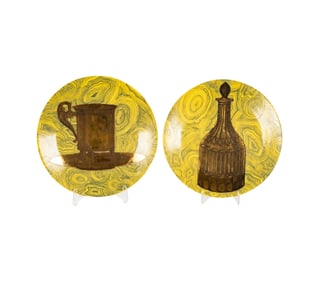 A Pair of Piero Fornasetti Porcelain Plates