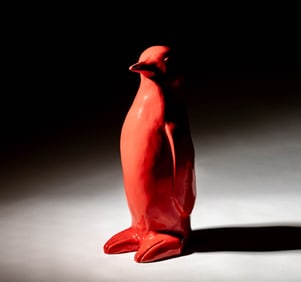 An American Red Ceramic Penguin Figure