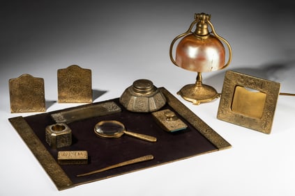 A Tiffany Studios Zodiac Gilt Bronze Desk Set and Lamp