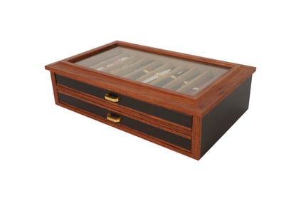 A Group of Pens and a Storage Box