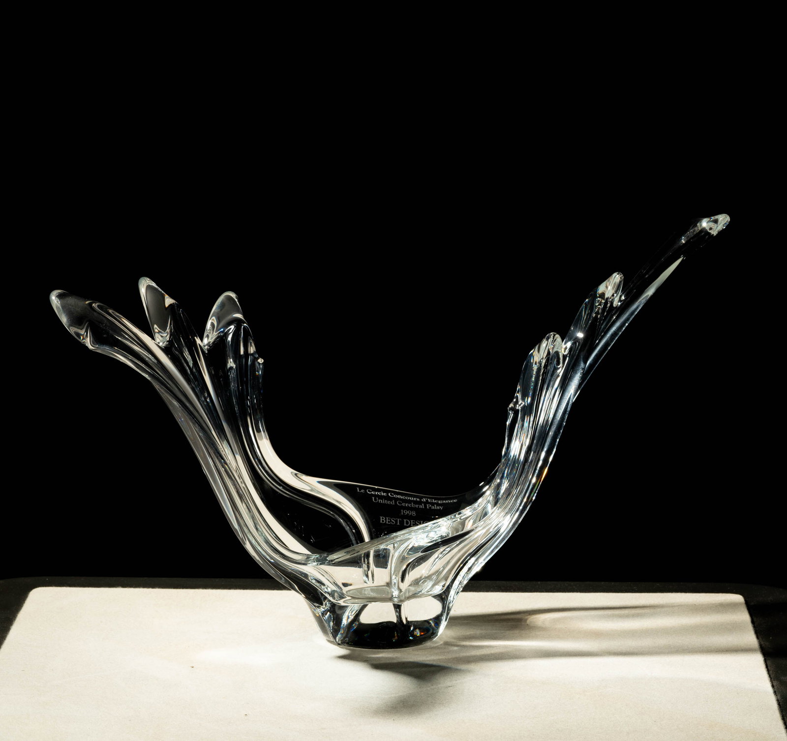 Le Cercle Concours d'Elegance United Cerebral Palsy Best Design Trophy: 1998, crystal, signed Made in France to Underside 11 x 20 1/2 x 6 in. (27.9 x 52.1 x 15.2 cm.)