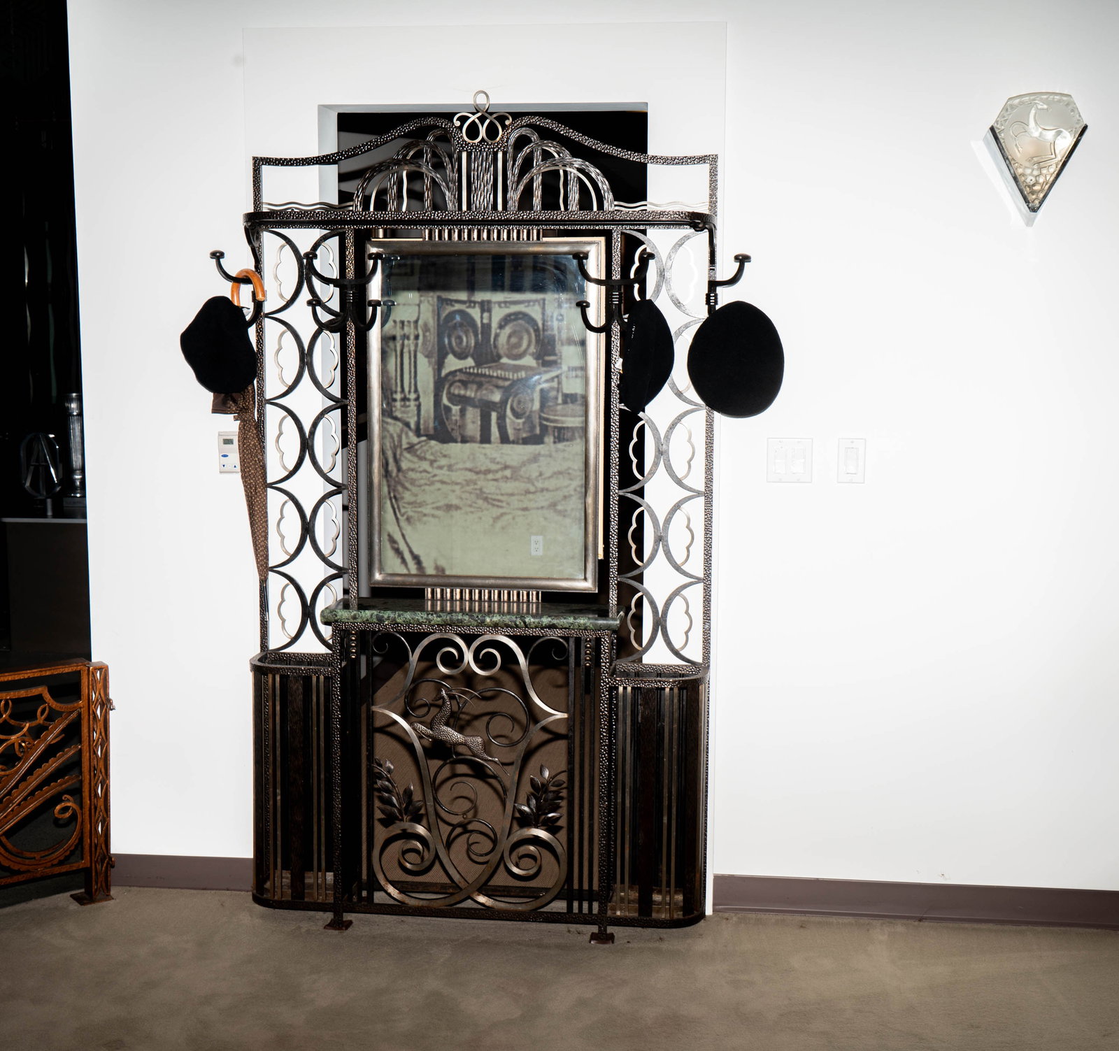 Deco Style Iron and Marble Hall Tree: with a deer motif lower 84 x 46 1/2 x 9 in. (213.4 x 118.1 x 22.9 cm.)