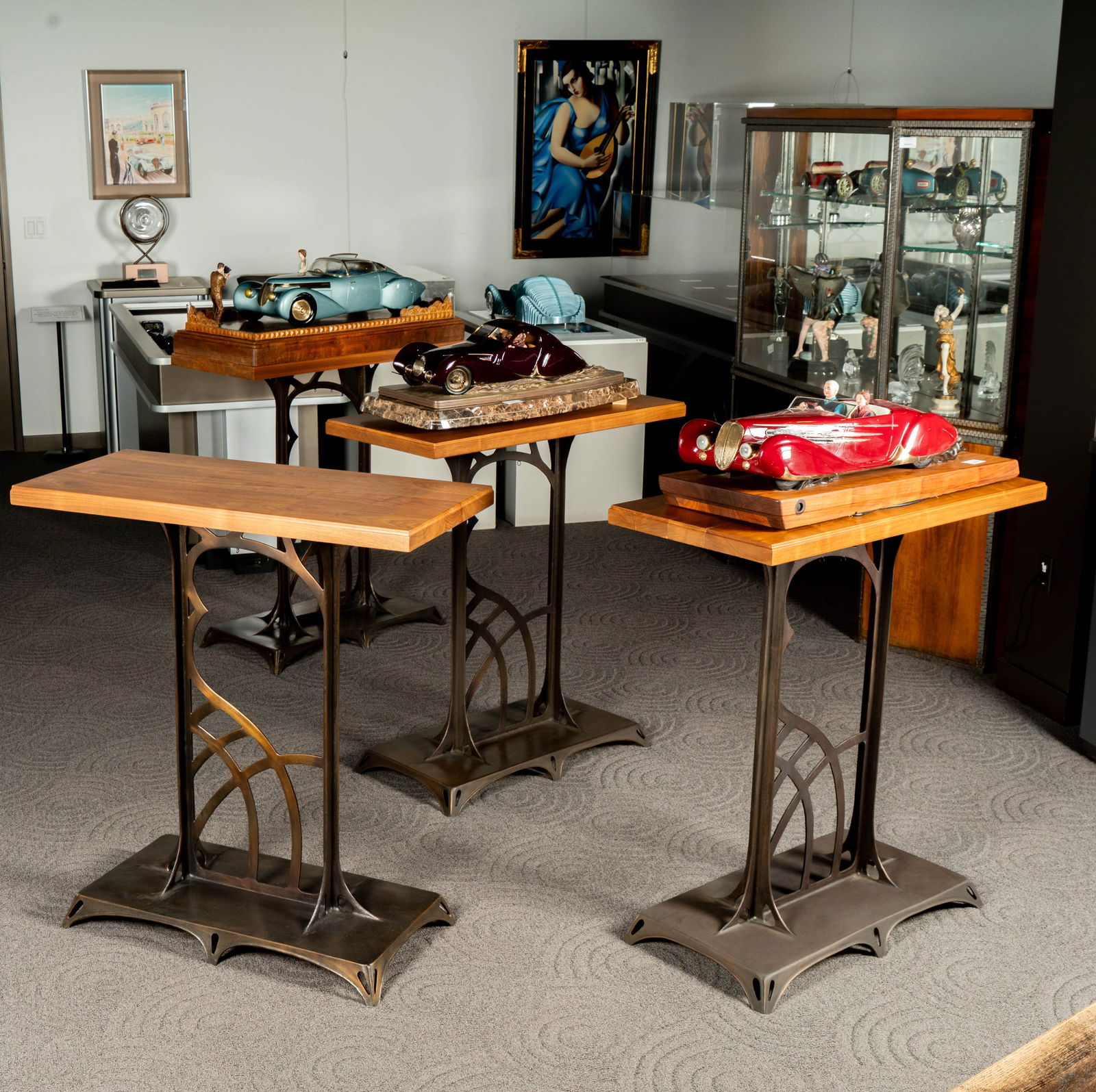 Four Nouveau Style Bronze and Metal Console Tables: 20th Century, custom made, each with hanging hooks to the top rail on bronze, for display purposes 40 1/2 x 37 1/2 x 17 1/2 in. (102.9 x 95.3 x 44.5 cm.)