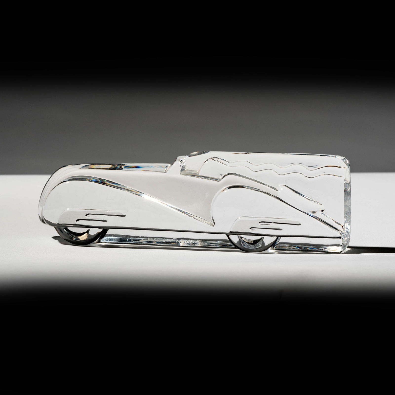 Daum France Deauville Relief: signed to lower edge 2 3/4 x 9 x 1 1/2 in. (7 x 22.9 x 3.8 cm.)