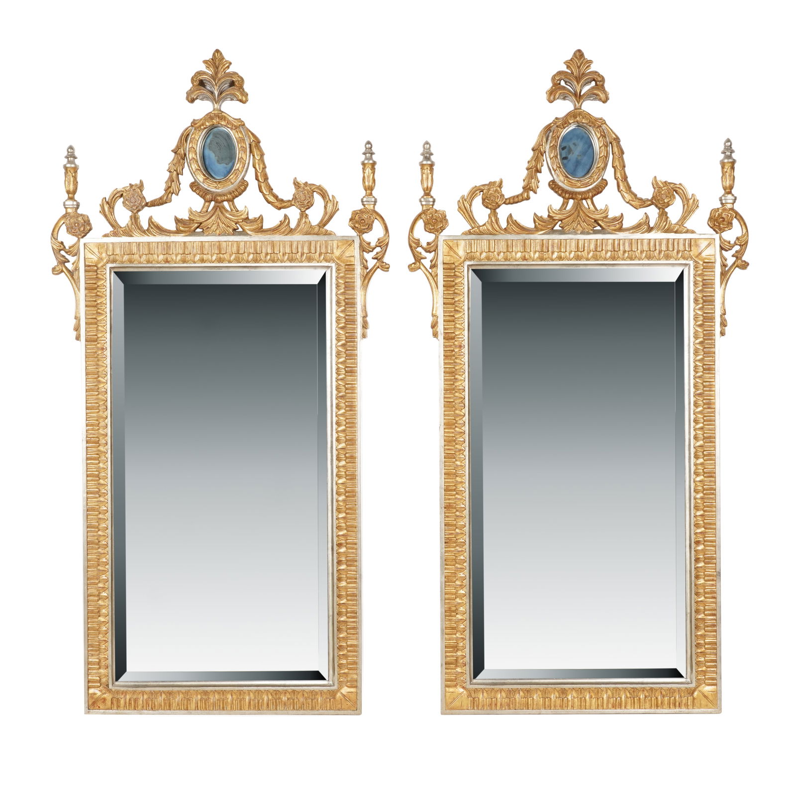 A Pair of Gilt and Silvered Neoclassical-Style Mirrors: late 20th / 21st century 63 1/2 x 32 1/2 in. (161.3 x 82.6 cm.)