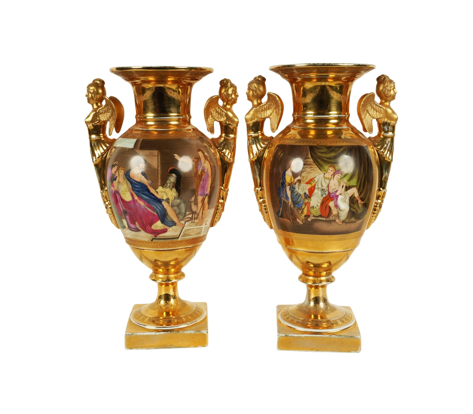 A Pair of Figural Porcelain Urns: contemporary, with figural handles and printed decoration 16 1/4 x 9 x 6 in. (41.3 x 22.9 x 15.2 cm.)