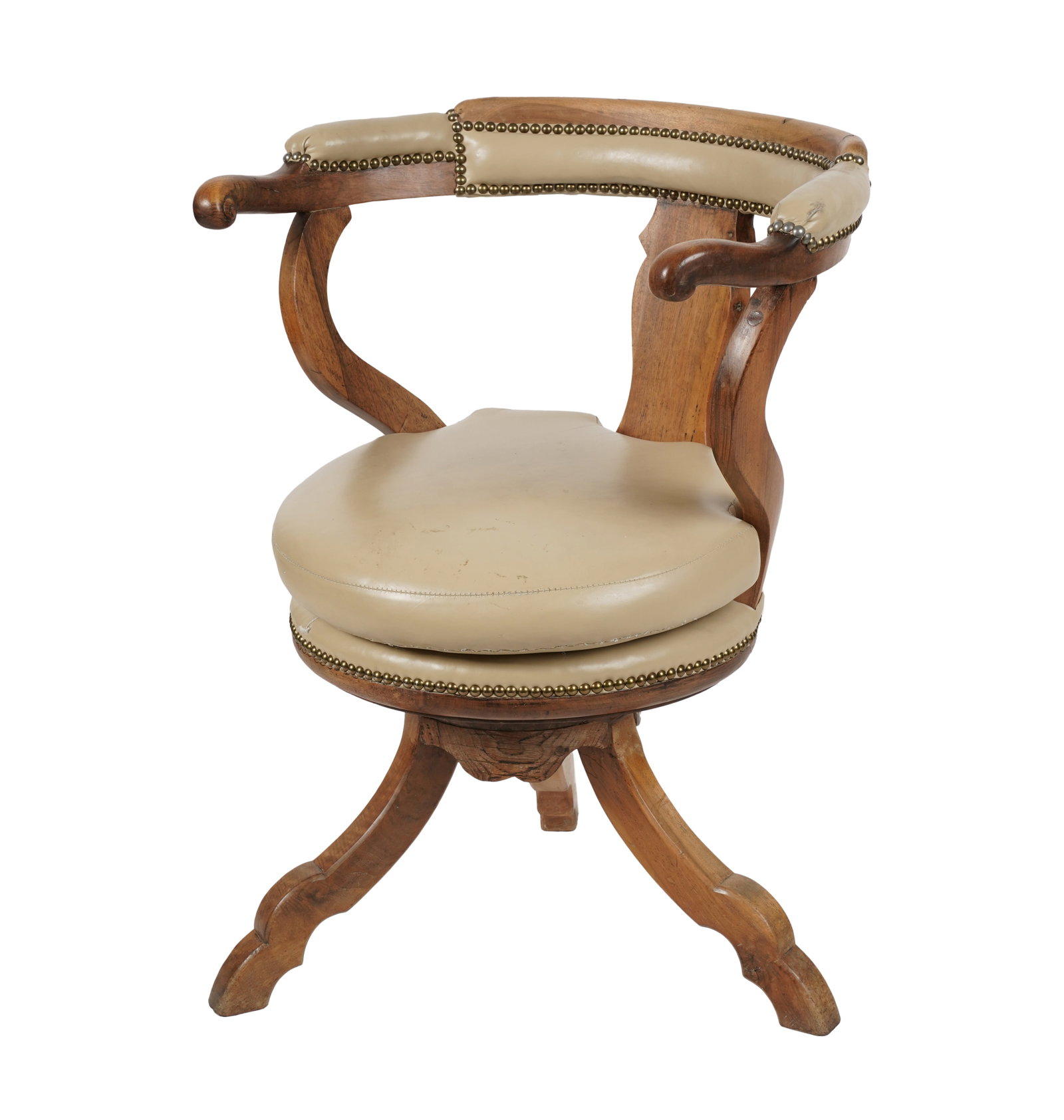 A Continental Swivel Desk Chair: 19th century, covered with later cream leather 33 x 25 1/2 x 20 in. (83.8 x 64.8 x 50.8 cm.), Seat height: 20 in. (50.8 cm.) Provenance: Property from the collection of George Doan, Philadelphia, PA. 