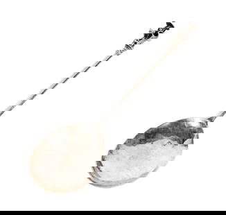 An English Silver Apostle Spoon: the terminal modeled as a figure of St. Peter; spurious mark for Hester Bateman, and marked for London, sterling, and date marked "p" (to stem), marked again for London (to bowl); Approximately 45 gra