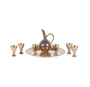 A Modernist Hammered Sterling Drink Service