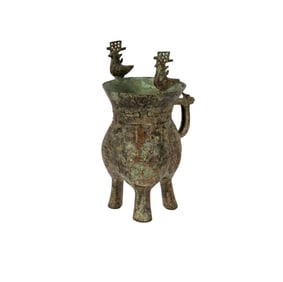 An Archaic Bronze Ritual Wine Vessel