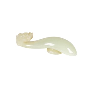 A Chinese Carved White Jade Buckle