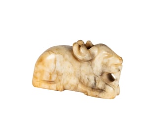 A Chinese Carved Jade Ram Toggle