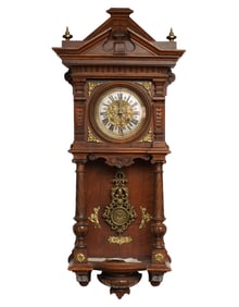 A 19th Century German Carved Wood Wall Clock