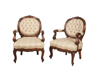 A Pair of Rococo Revival Carved Walnut Parlor Chairs