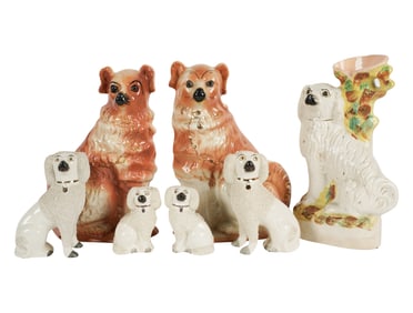 A Group of Staffordshire Pottery Dogs