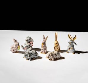 A Group of Seven Herend Fishnet Porcelain Rabbit Figures