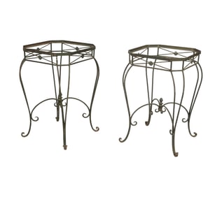 A Pair of Painted Iron Stands