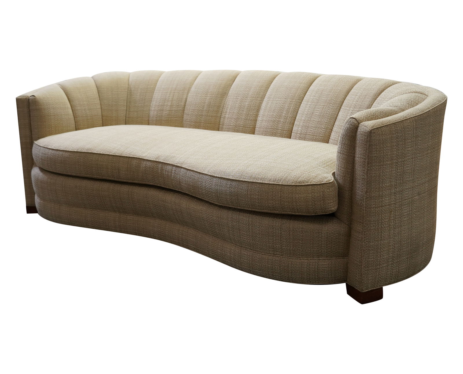 A Beige Upholstered Channel Back Curved Sofa (1 of 9)