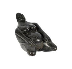 An African Carved Stone Figure of a Woman